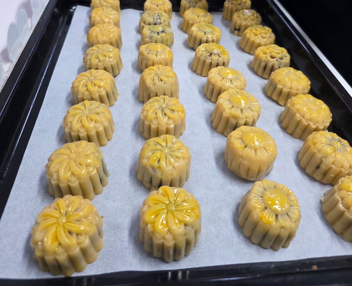 Freshly moulded flower-shaped mooncakes on a tray at an Edufarm mooncake making workshop